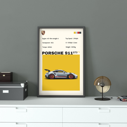 Framed Porsche 911 GT3rs Wall Art displayed on a dresser, showcasing the car's specs and design, perfect for modern home or office decor.